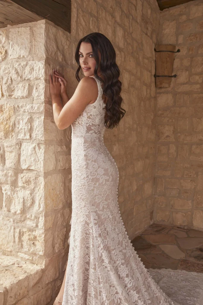 Photograph of Posie, from the Serene by Madi Lane Collection, is a lace dress for the older bride