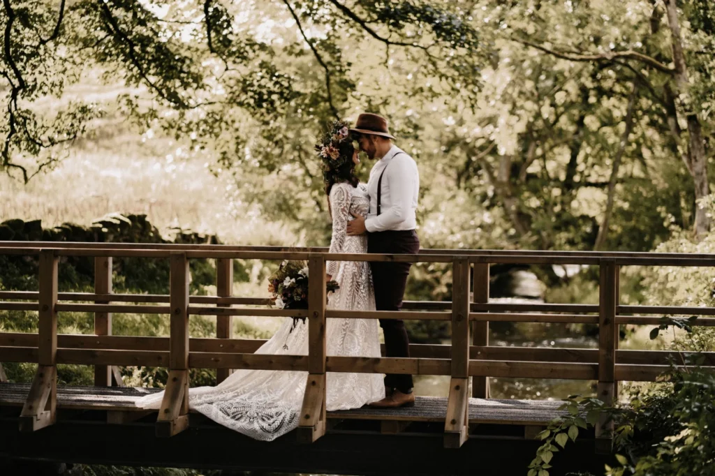 Photograph of an intimate autumn Wedding by Mark Bamforth Photography featuring a dress from Shikoba Bride